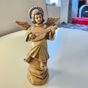 The wooden angle figurine